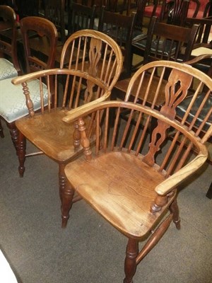 Lot 748 - A 19th century ash and elm Windsor armchair and another similar with crinaline stretcher