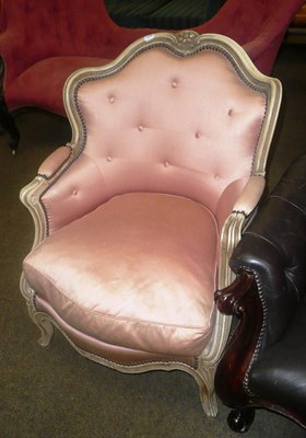 Lot 752 - French style cream painted armchair with peach coloured upholstery