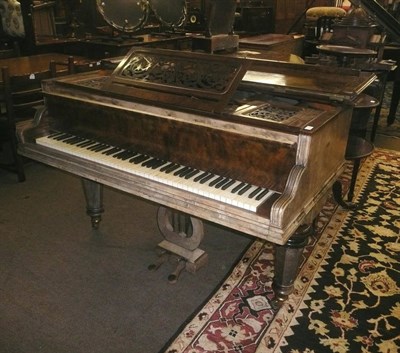 Lot 762 - A walnut cased grand piano by Kirkman London (faded)