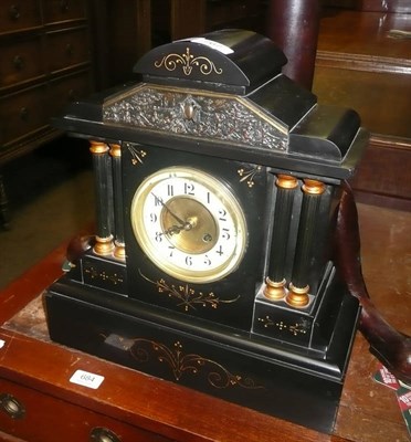 Lot 767 - A black slate mantel clock