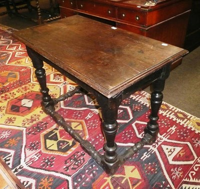 Lot 768 - 18th century and later carved oak side table