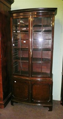 Lot 797 - Georgian style mahogany bow fronted glazed bookcase