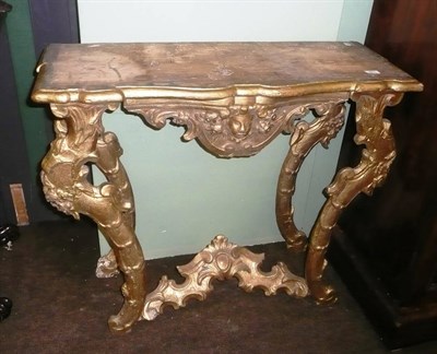 Lot 801 - A carved gilt wood pier table (lacking top)