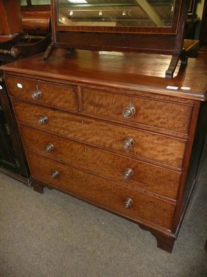 Lot 804 - A Georgian mahogany four height chest of drawers