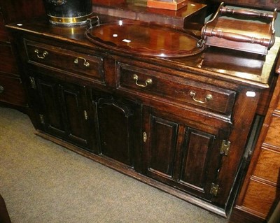 Lot 806 - An early 19th century oak sideboard