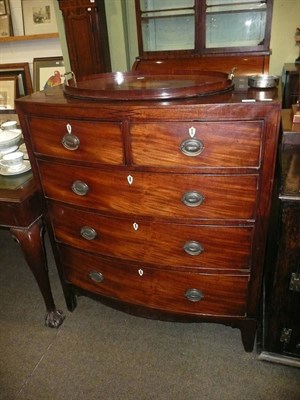 Lot 808 - Georgian mahogany bow front height chest