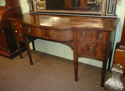 Lot 821 - Large mahogany serpentine fronted sideboard