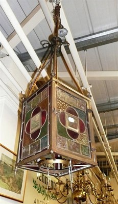 Lot 829 - Brass hall lantern with leaded and stain glass panels