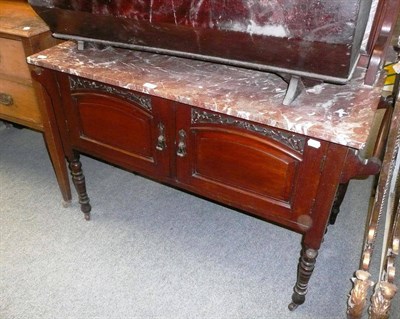 Lot 1129 - Late Victorian walnut washstand with marble top