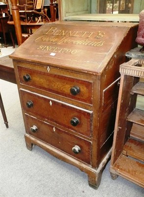 Lot 1156 - 19th century painted pine clerks desk over three drawers 'Bennett's Corn merchants since 1790'