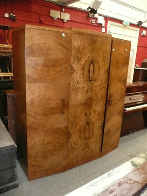 Lot 1159 - A 1930's walnut triple wardrobe