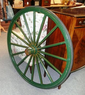 Lot 1219 - Green painted carriage wheel