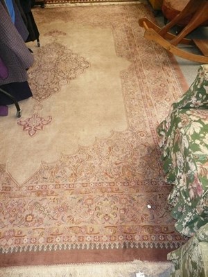 Lot 1223 - Indian carpet with plain cream field and central floral vines