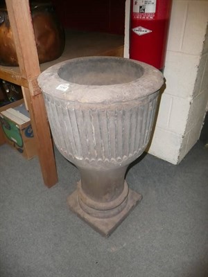 Lot 1242 - A carved stone garden pedestal planter