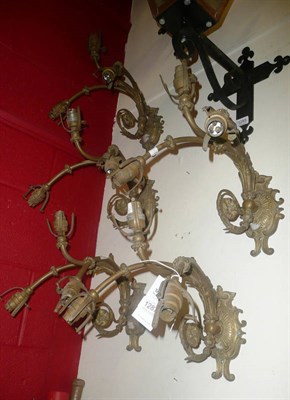 Lot 1287 - Composite set of seven three branch gilt metal wall lights