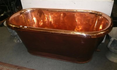 Lot 1307 - A copper roll top bath