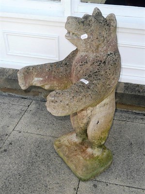 Lot 1313 - A cast composition stone figure of a standing bear with arms out held, 95cm high