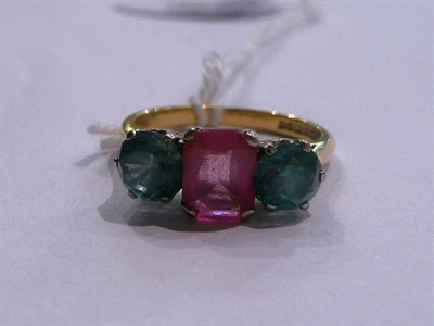 Lot 19 - An 18ct gold pink stone and blue zircon ring