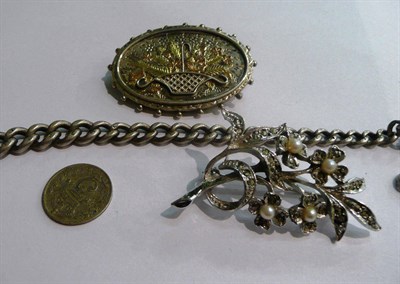 Lot 43 - A piece of silver curb chain, a silver brooch with gold overlay, a coin and a brooch