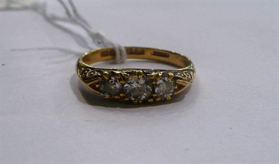 Lot 44 - An 18ct gold diamond three stone ring, Birmingham 1910