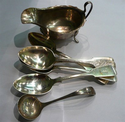 Lot 48 - A silver sauceboat and silver spoons, 14oz approx
