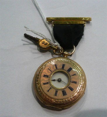 Lot 54 - A lady's fob watch stamped '14K'