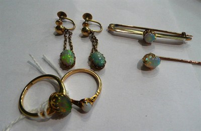 Lot 67 - Two opal set rings, a bar brooch, a stick pin and earrings