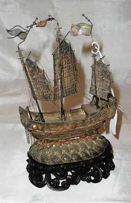 Lot 75 - Late 19th century Chinese silver junk with base