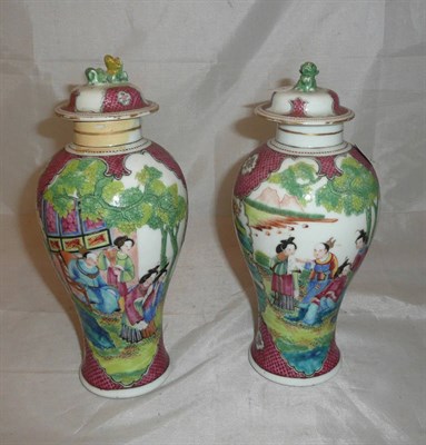 Lot 91 - Pair of famille rose 19th century baluster vases and covers