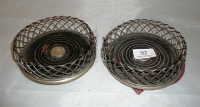 Lot 92 - A pair of silver plate wine coasters
