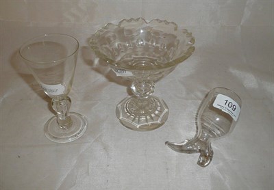 Lot 109 - A Georgian glass stirrup cup modelled as a boot, 18th Century style wine glass and a sweetmeat dish
