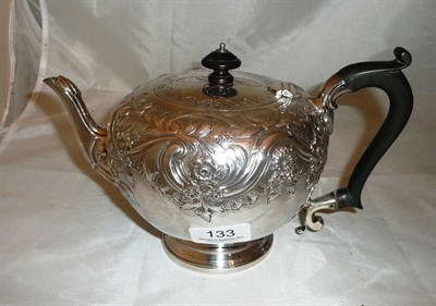 Lot 133 - A silver teapot with repoussé decoration, 24oz approx
