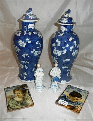 Lot 135 - A pair of Oriental blue and white vases and covers, two Italian Majolica tiles and a pair of...