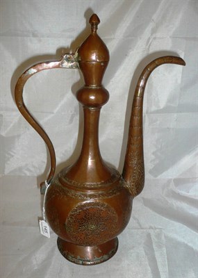 Lot 145 - A 19th century Persian engraved coffee pot