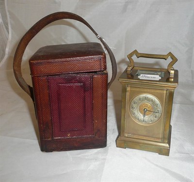 Lot 156 - A brass striking carriage clock in case