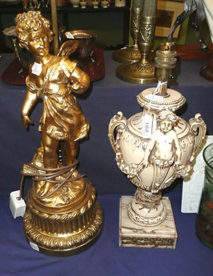 Lot 162 - Late 19th century painted metal cherub lamp and a gilt composition cherub lamp