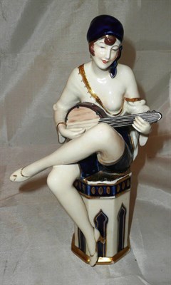 Lot 181 - A Royal Dux figure of an Art Deco lady
