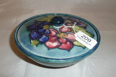 Lot 209 - A Moorcroft blue ground bowl and cover