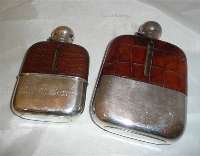 Lot 210 - Silver and skin hip flask and a plated and skin hip flask