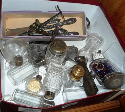 Lot 220 - Quantity of silver-topped jars, chain mail purse, knife rests, button hooks, etc