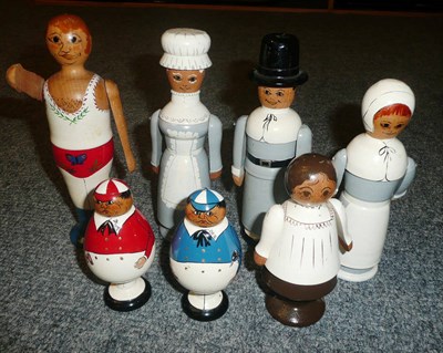 Lot 222 - Seven painted wooden figures by Robin & Nell Dale, England