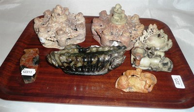 Lot 225 - A collection of seven Chinese carved soapstone ornaments