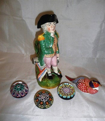 Lot 234 - Toby jug, Royal Crown Derby paperweight and three glass paperweights