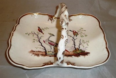 Lot 237 - A Staffordshire porcelain basket, circa 1830, of shaped rectangular form, with rustic overhead...