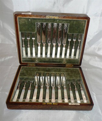 Lot 238 - An oak cased set of silver plated fruit knives with mother of pearl handles, total weight incl...