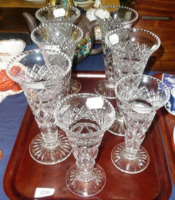 Lot 239 - Set of four Edwardian cut-glass vases and two smaller matching