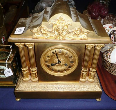 Lot 256 - A gilt metal striking mantel clock