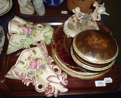 Lot 259 - Tray including Wedgwood wall pockets, cabinet plates, Continental figure group and a Capo di...