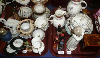 Lot 269 - Two trays of 19th century and later ceramics including tea bowls, Coalport jugs Nao figure,...