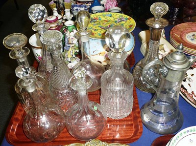 Lot 271 - Tray of glass decanters and stopper including a claret jug and a silver-mounted example